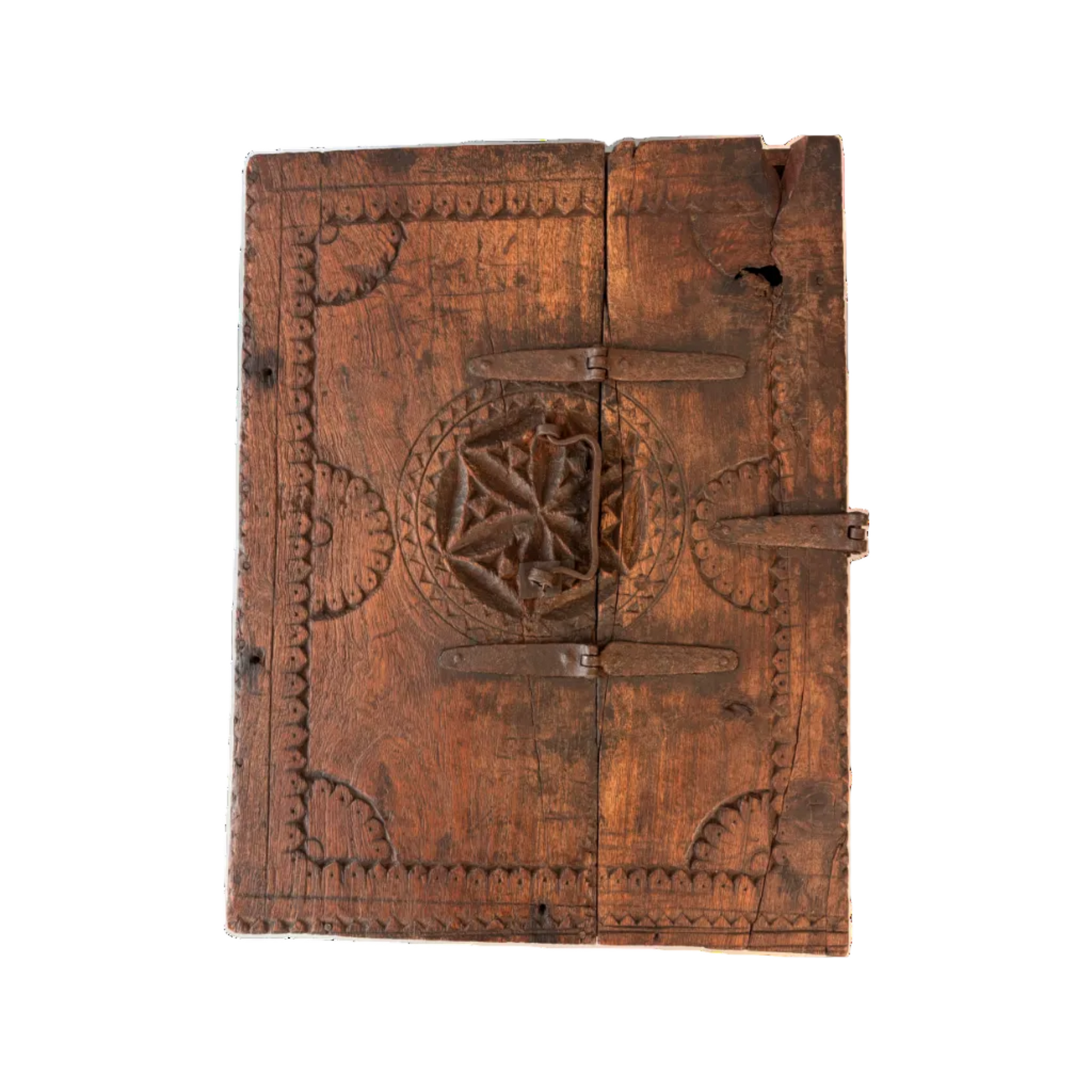 Top view of antique carved wooden dowry box with forged iron carry handle and oxidised strapwork