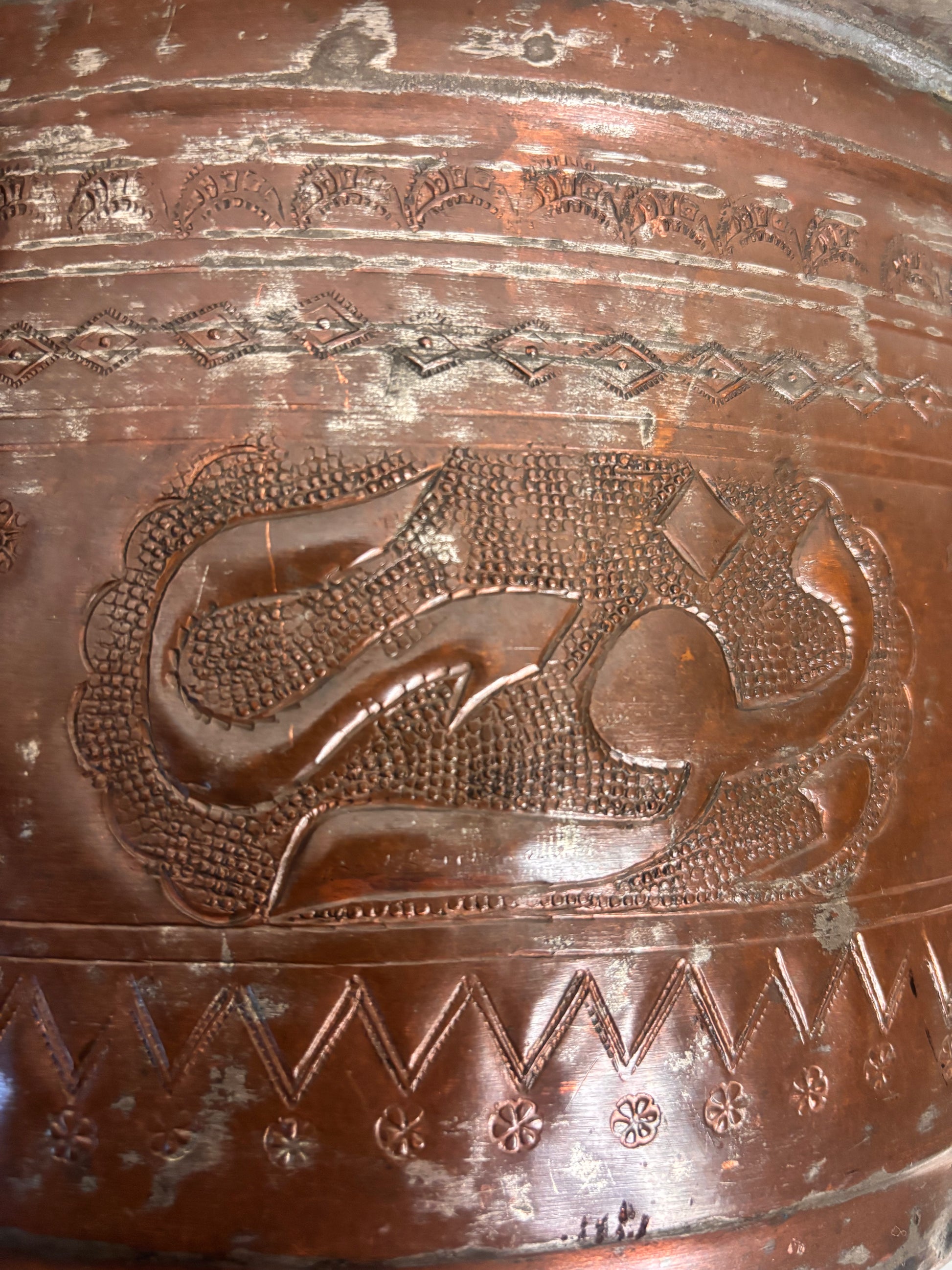 Large tinned copper vessel with stamped geometric bands and calligraphic cartouches, Ottoman/Qajar style, 32.5 cm diameter.