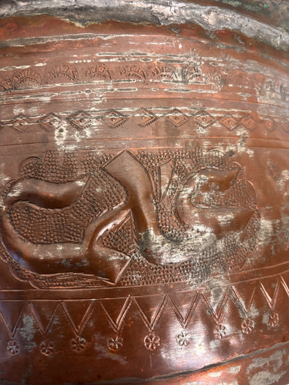 Large tinned copper vessel with stamped geometric bands and calligraphic cartouches, Ottoman/Qajar style, 32.5 cm diameter.