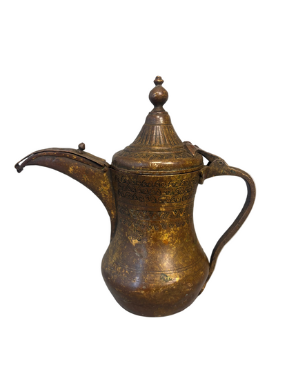 Antique Middle Eastern Bedouin brass dallah coffee pot with engraved decoration and domed lid