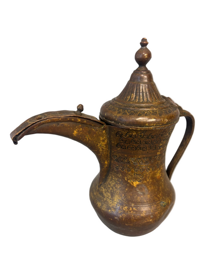 Antique Middle Eastern Bedouin brass dallah coffee pot with engraved decoration and domed lid