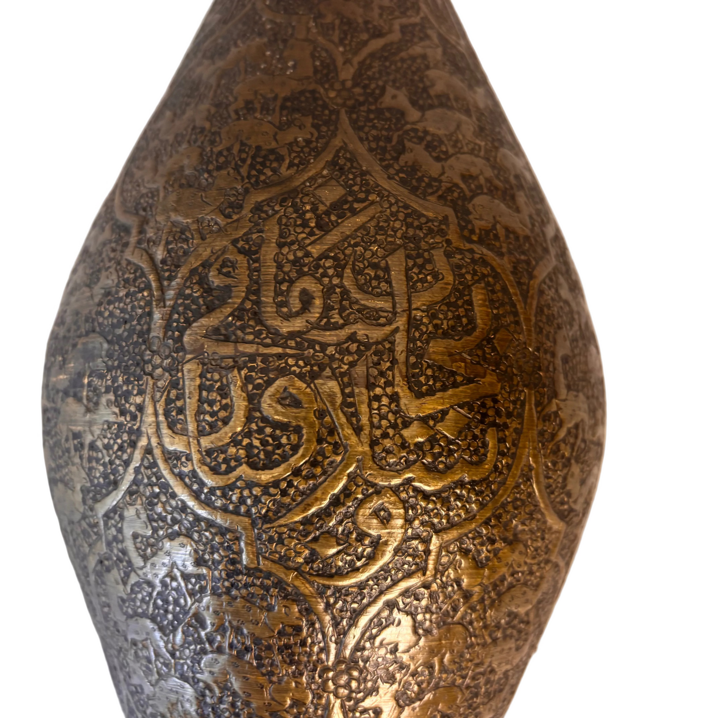 Detail of Persian brass vase showing engraved calligraphy within cartouche