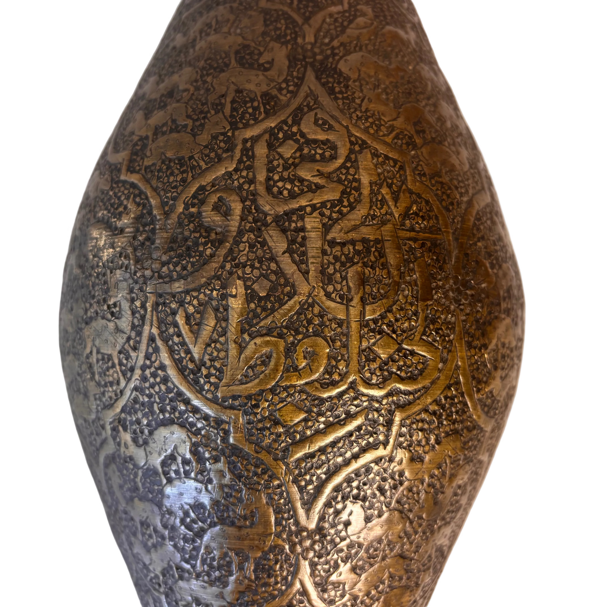 Detail of Persian brass vase showing engraved calligraphy within cartouche