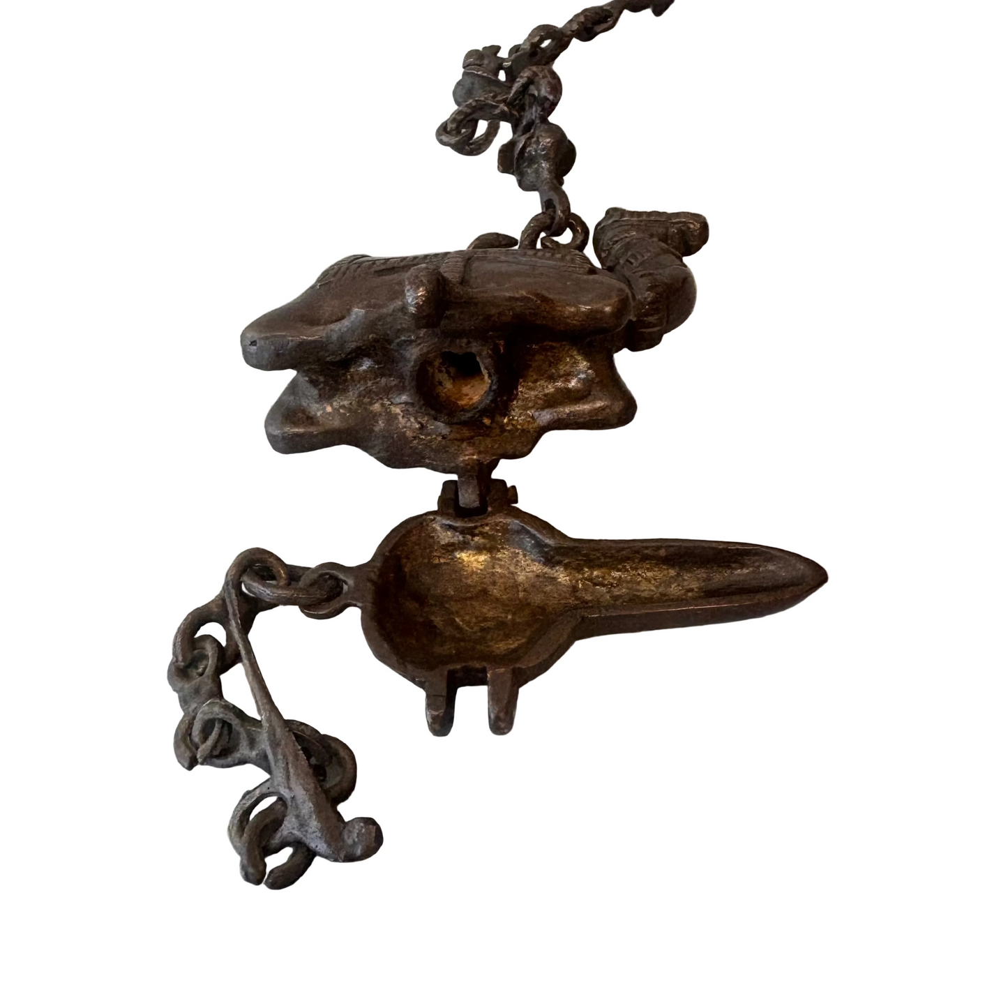 Antique Indian bronze camel oil lamp with suspended figural chain, late 19th century