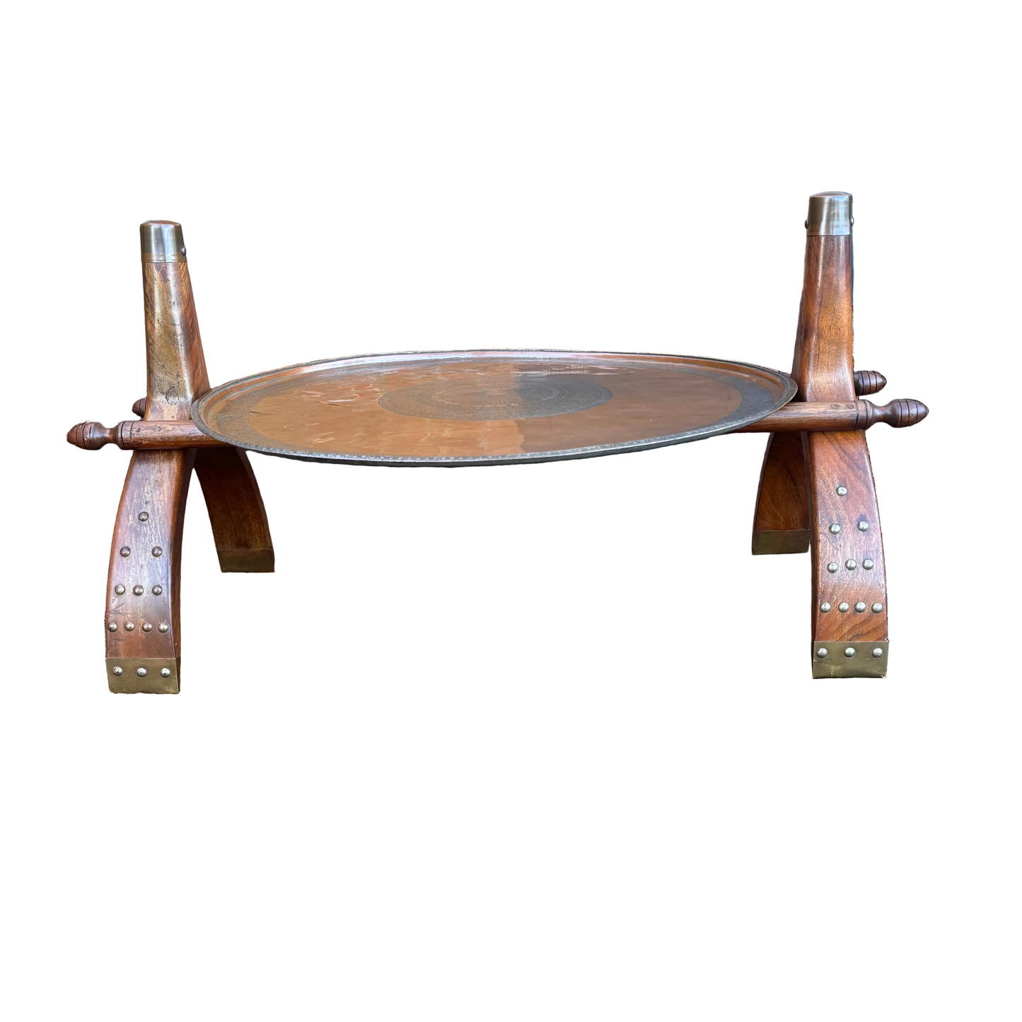 Safavid Persian engraved copper tray with calligraphic medallion on mid-century Indian camel saddle wooden stand