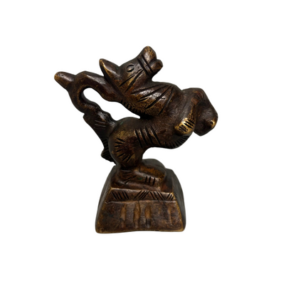 19th century Shan bronze opium weight in horse form with dark patina and worn surface