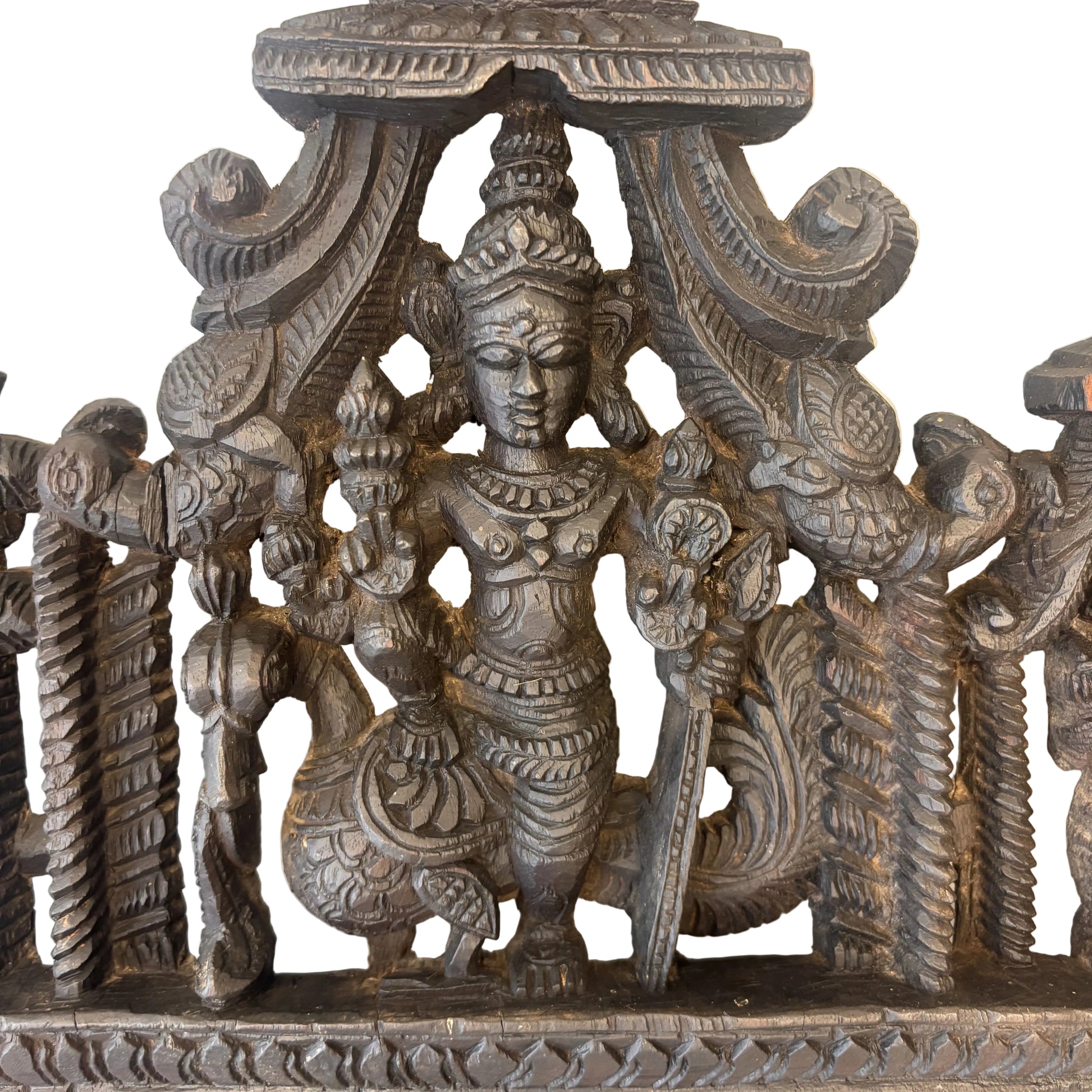 Detail of Lord Murugan holding vel spear on peacock