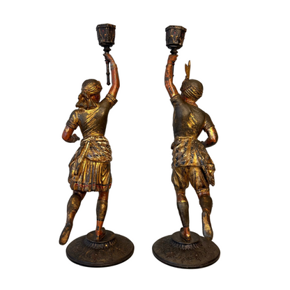 Rear view of antique French spelter figural candlesticks showing original paint and patina