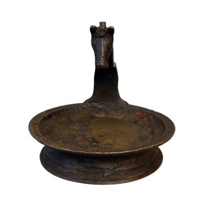 Profile view horse-head handle antique Kerala vilakku