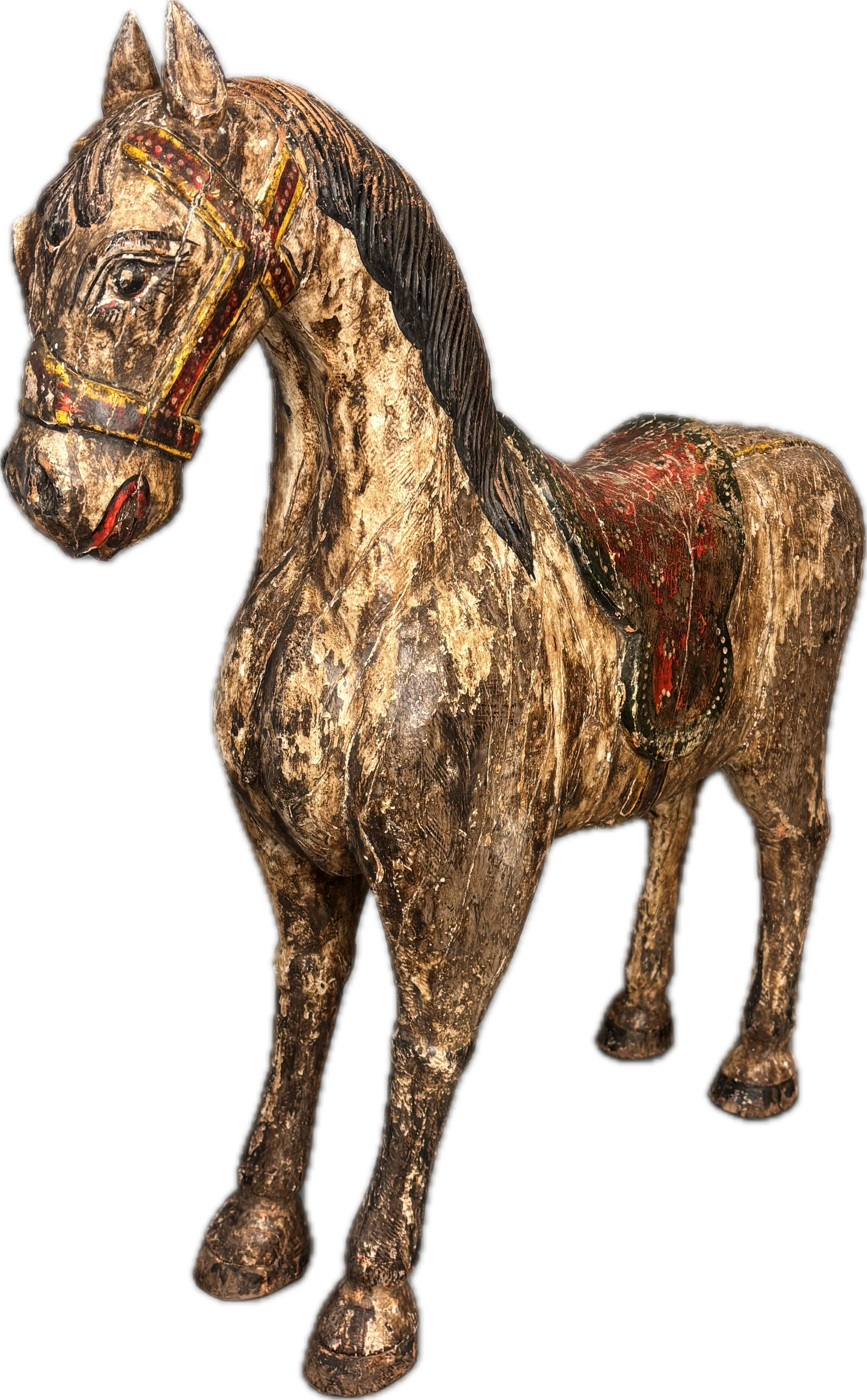 Side view of Tamil Nadu wooden votive horse showing carved saddle and harness detail