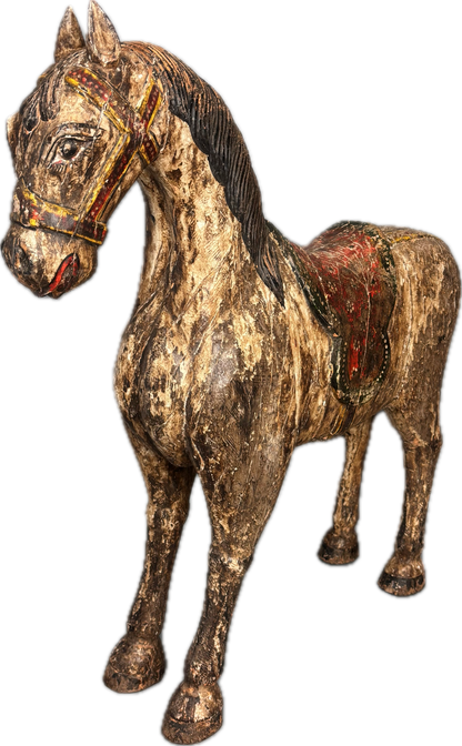 Side view of Tamil Nadu wooden votive horse showing carved saddle and harness detail