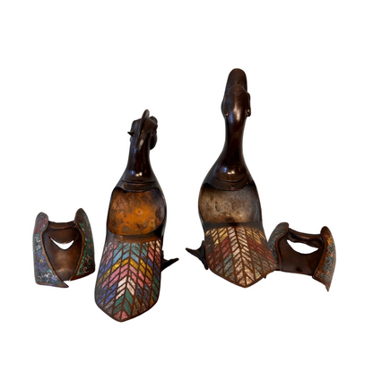 Interior of Chinese bronze mandarin duck incense burner showing incense chamber