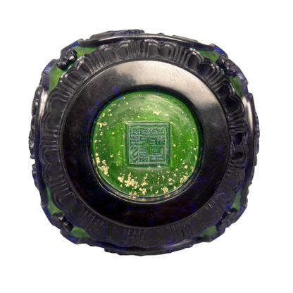 Base showing Chinese style seal mark in green glass