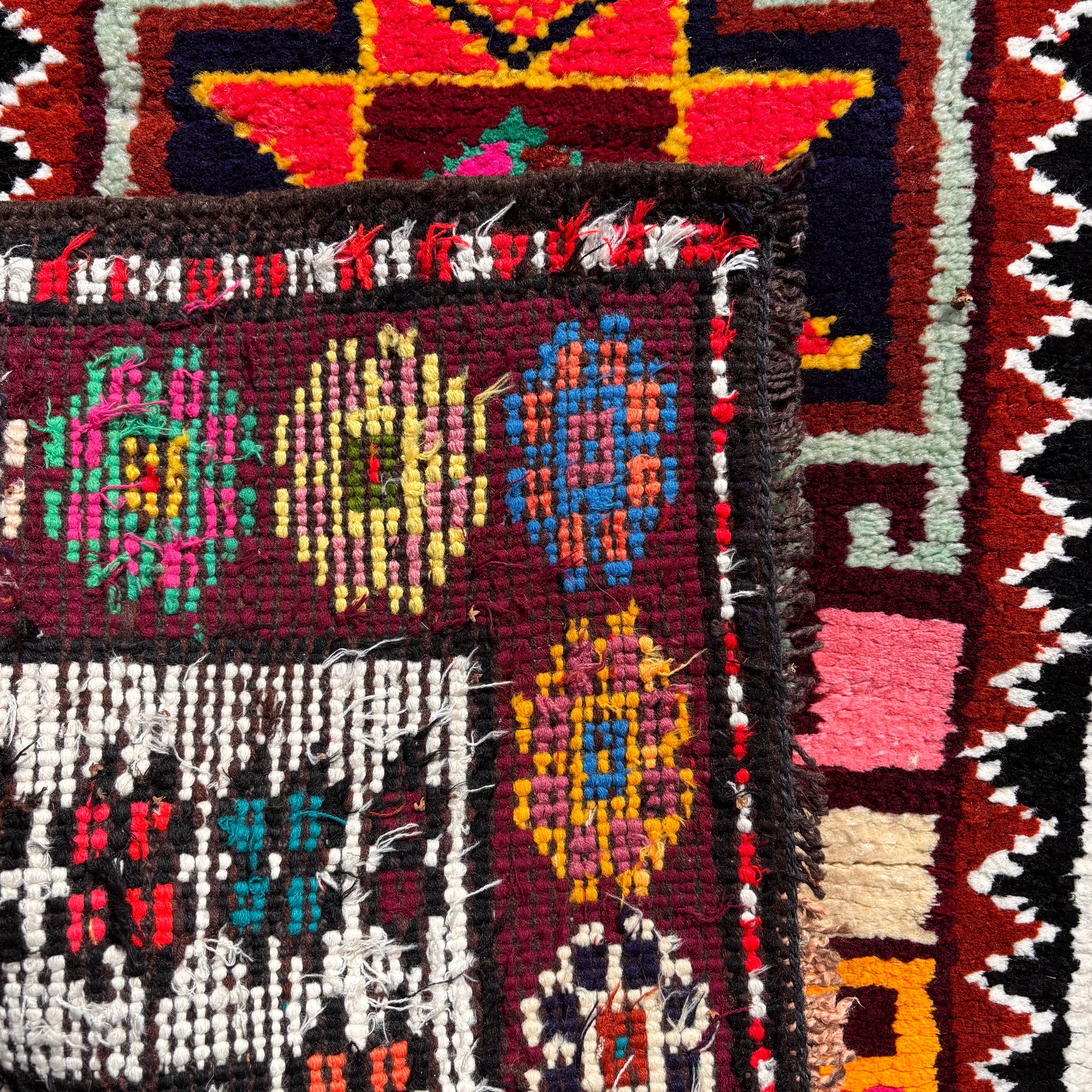 Reverse of hand knotted Kurdish runner showing weave structure
