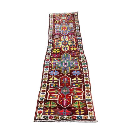 Kurdish geometric runner rug full length view on white background