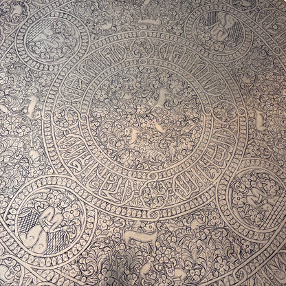 Central medallion with animals on Persian brass tray with detailed engraving