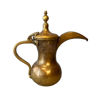 Traditional Gulf dallah brass pot side profile with aged patina