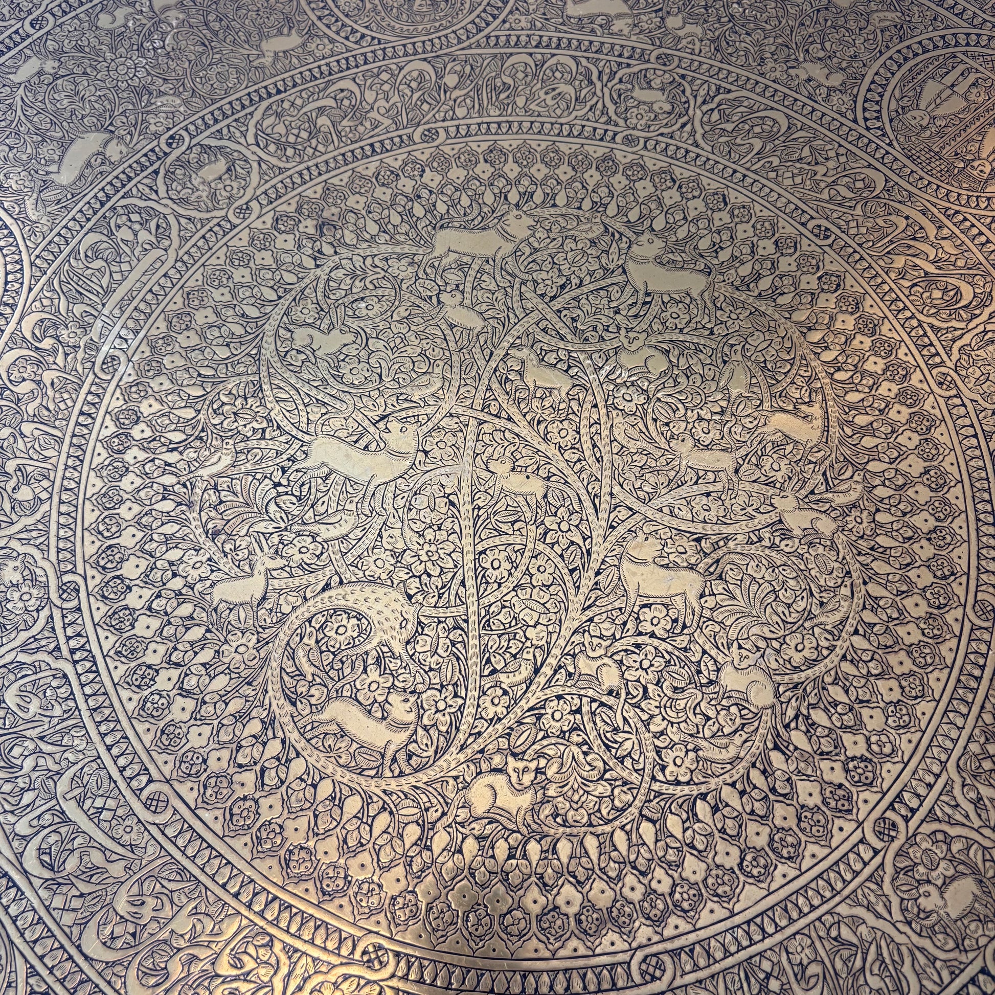 Close-up of Tree of Life with deer and birds engraving