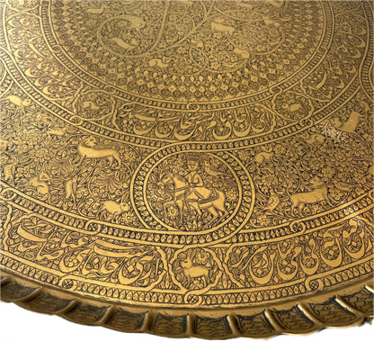 Equestrian figure detail on engraved Persian tray