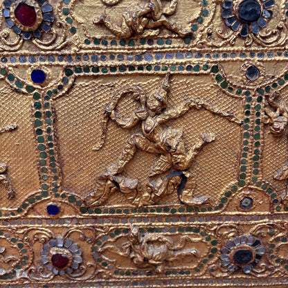 Close up view of narrative relief panels and thayo work.