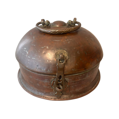 Large antique Indian copper betel nut box with domed lid and bronze handle