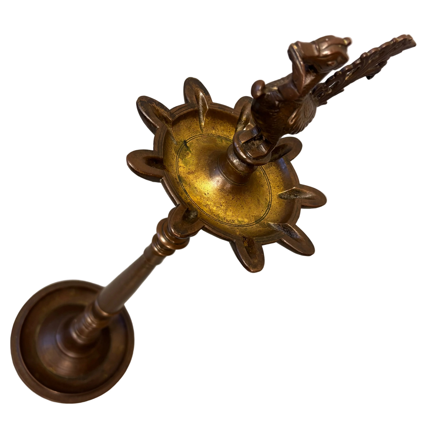 Top-down view of oil tray and finial