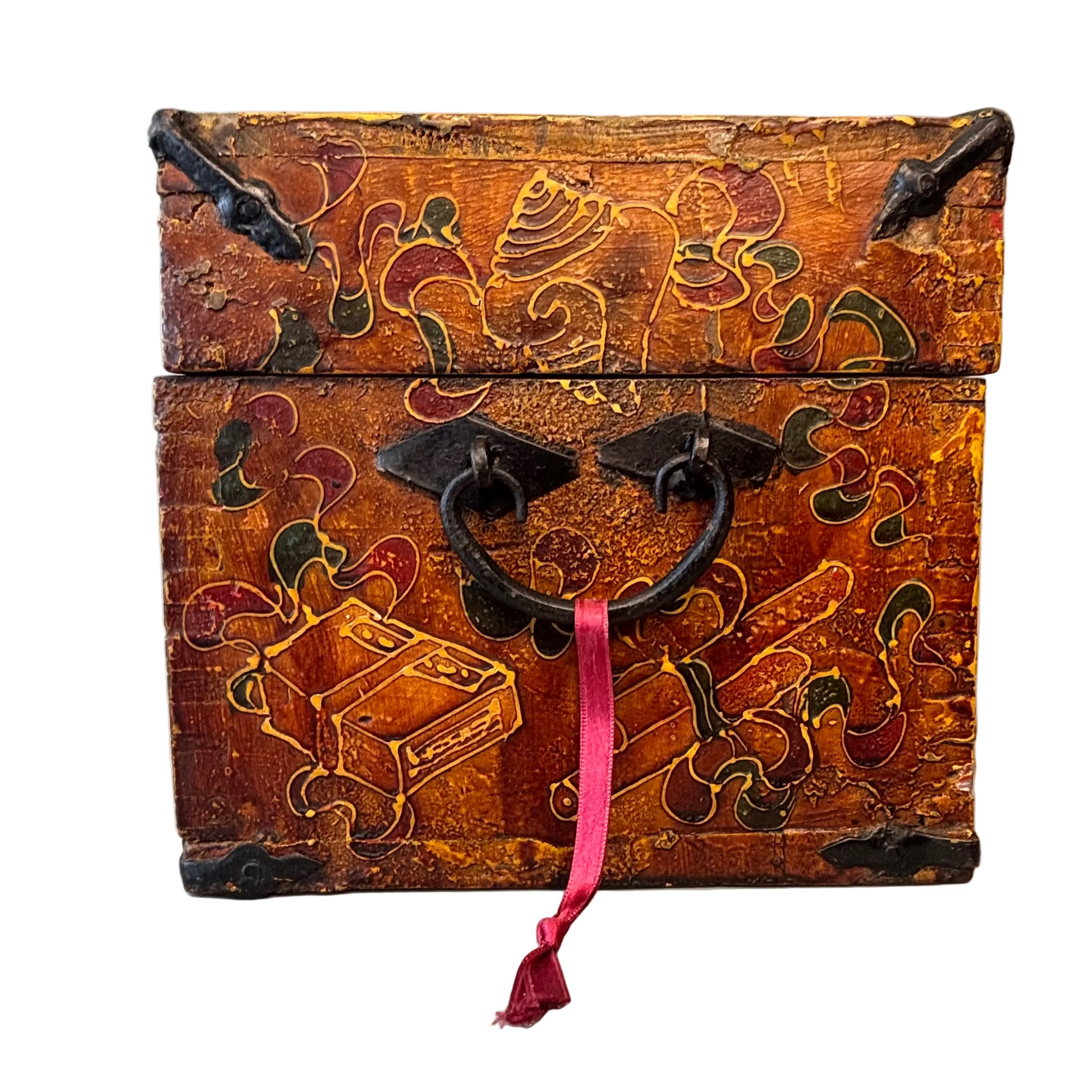 Side panel showing wrought iron handles  on Himalayan painted chest