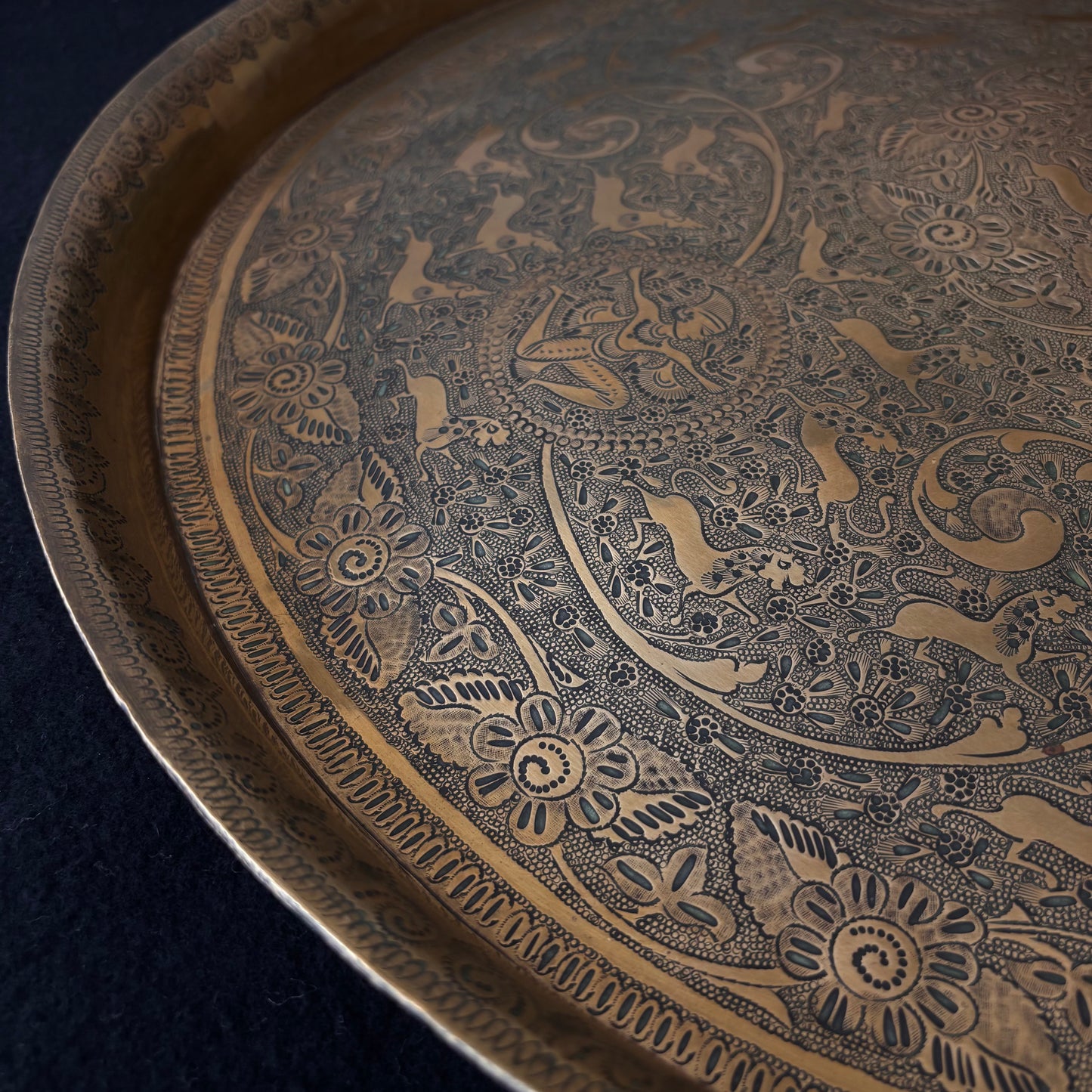 Hand chased brass tray with Mughal Revival decoration