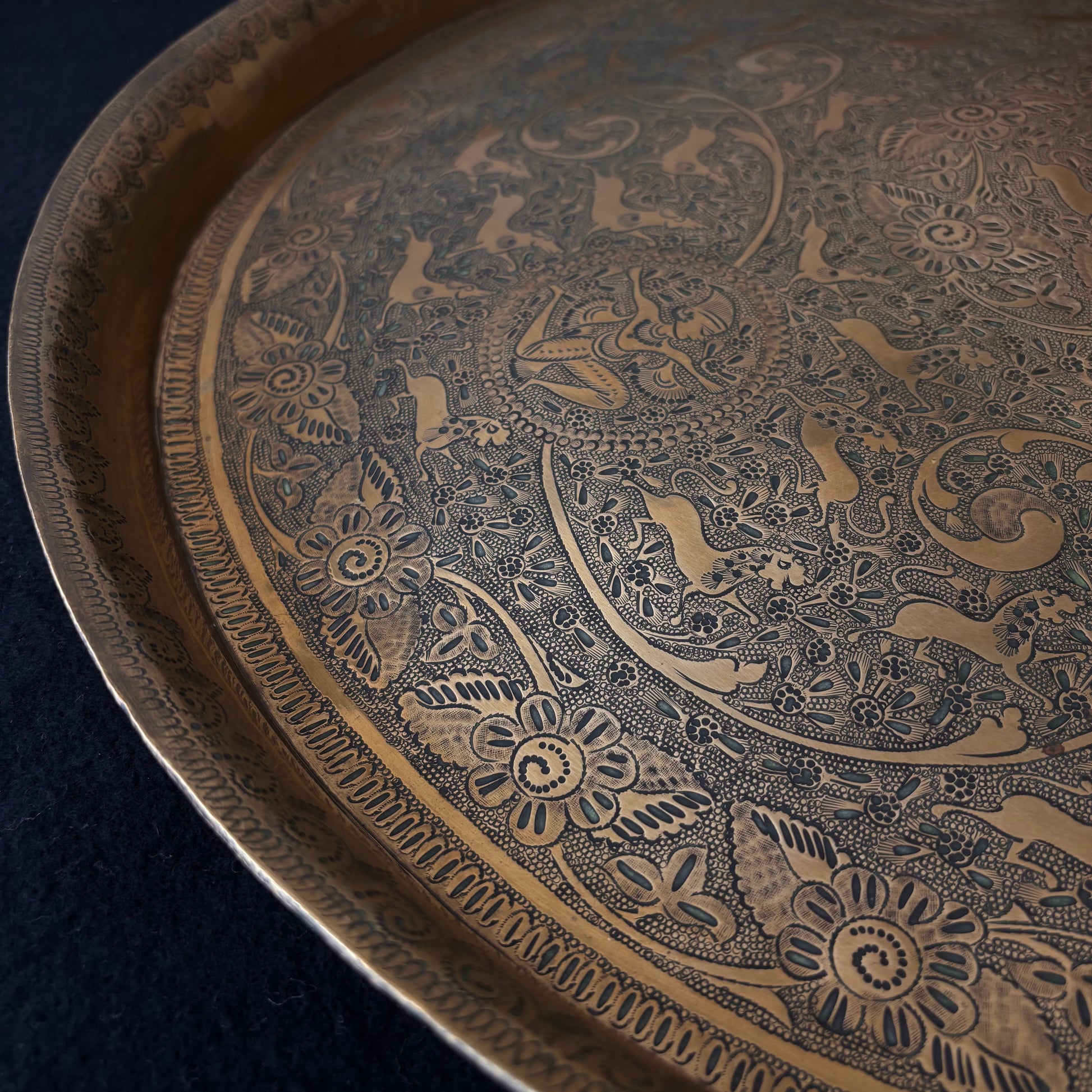 Hand chased brass tray with Mughal Revival decoration