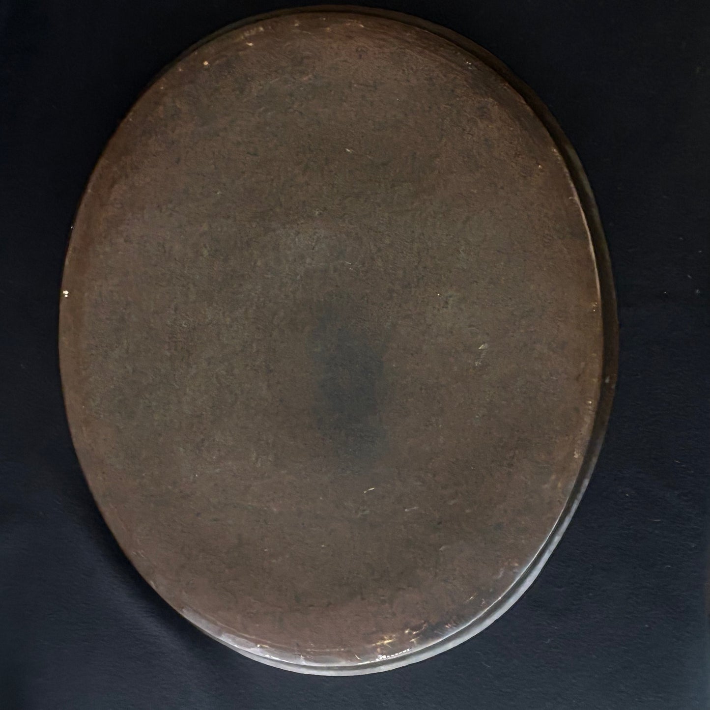 Reverse of heavy antique Indian brass serving tray
