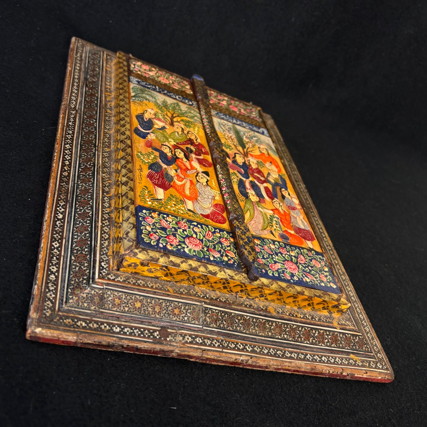 Angled view highlighting depth, craftsmanship and geometric marquetry detail
