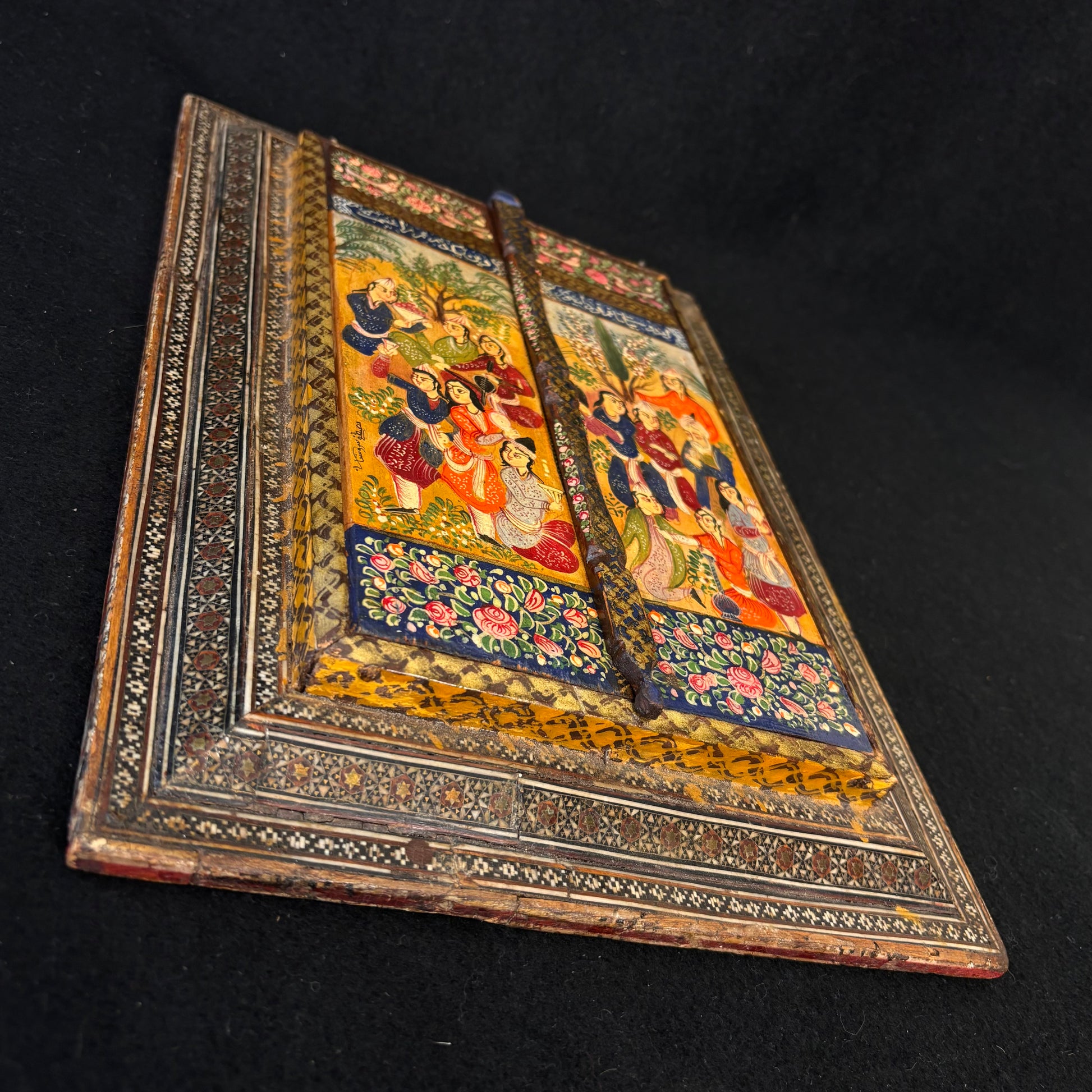 Angled view highlighting depth, craftsmanship and geometric marquetry detail