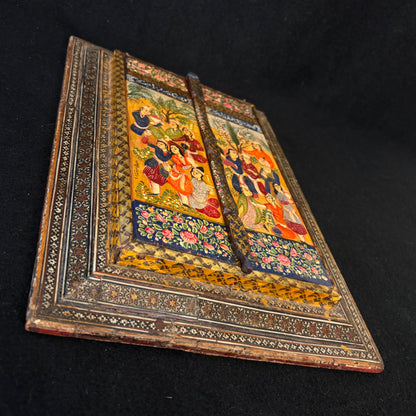 Angled view highlighting depth, craftsmanship and geometric marquetry detail