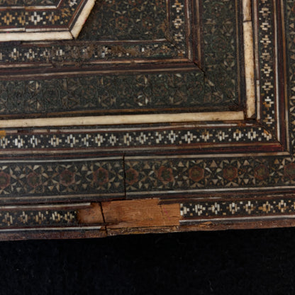 Historic loss to lower reverse border showing age and construction