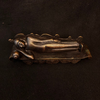 Full-length view of substantial Sri Lankan bronze reclining Buddha, 1.803 kg