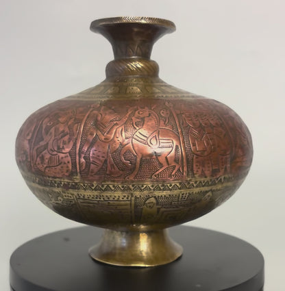 19th century Indian brass and copper chambu lota with ritual stones.